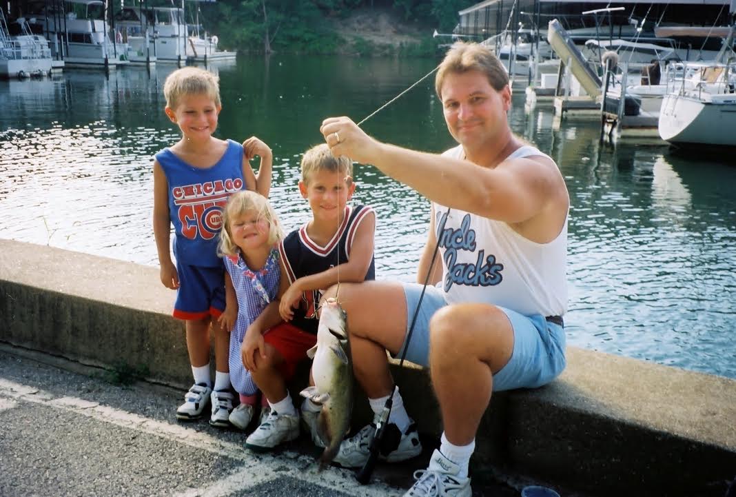 Joslin with her dad and older brothers fishing